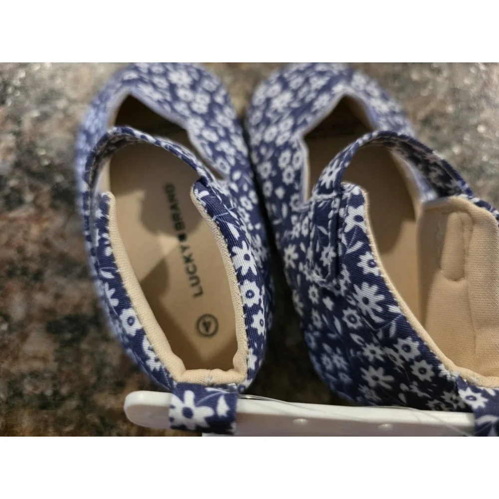 Lucky Brand. Size 4 baby girl slip on shoes. Blue and
